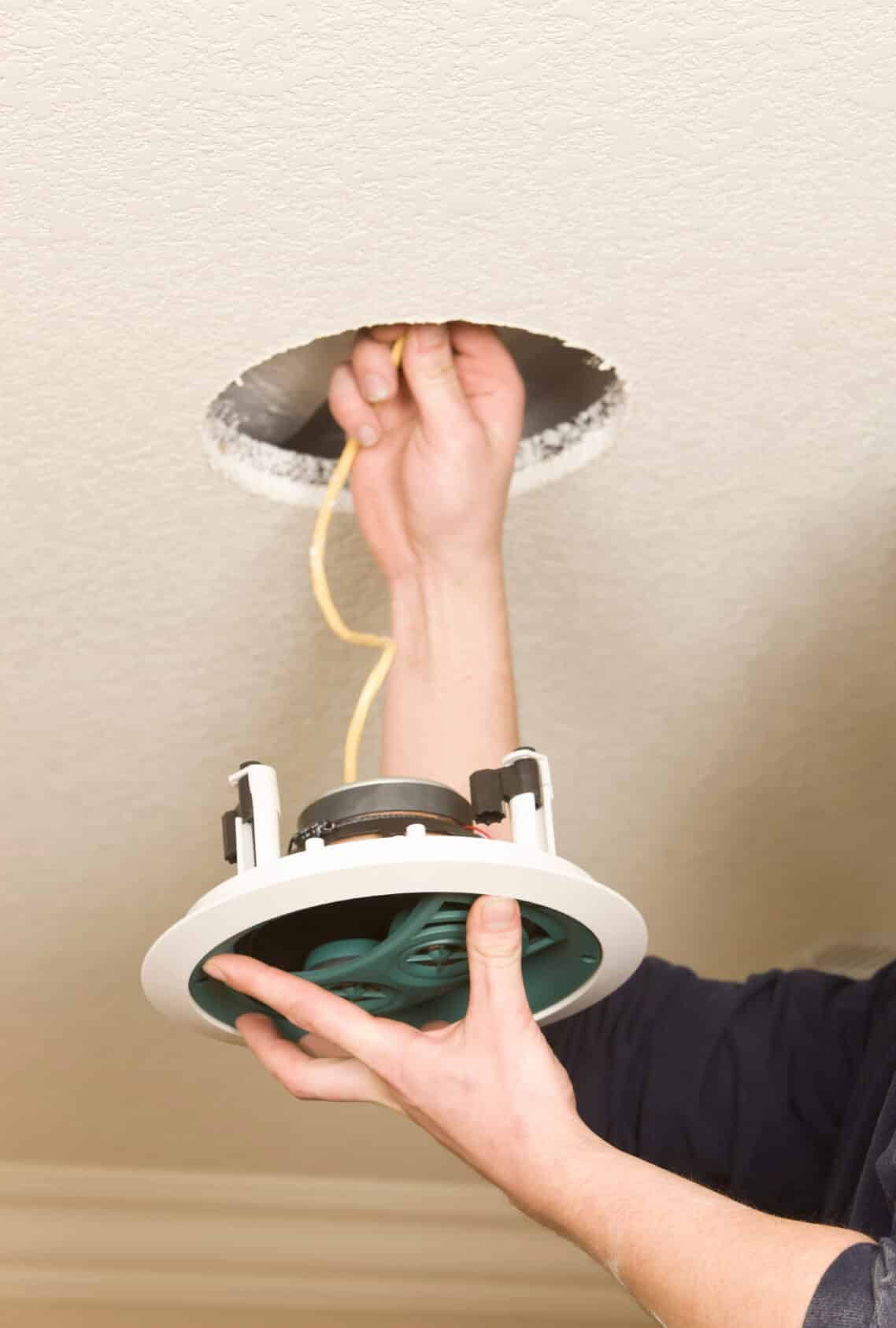 https://prolecelectricalanddataservices.com.au/wp-content/uploads/2025/02/ceiling-speaker-installed-in-a-modern-living-room.jpg