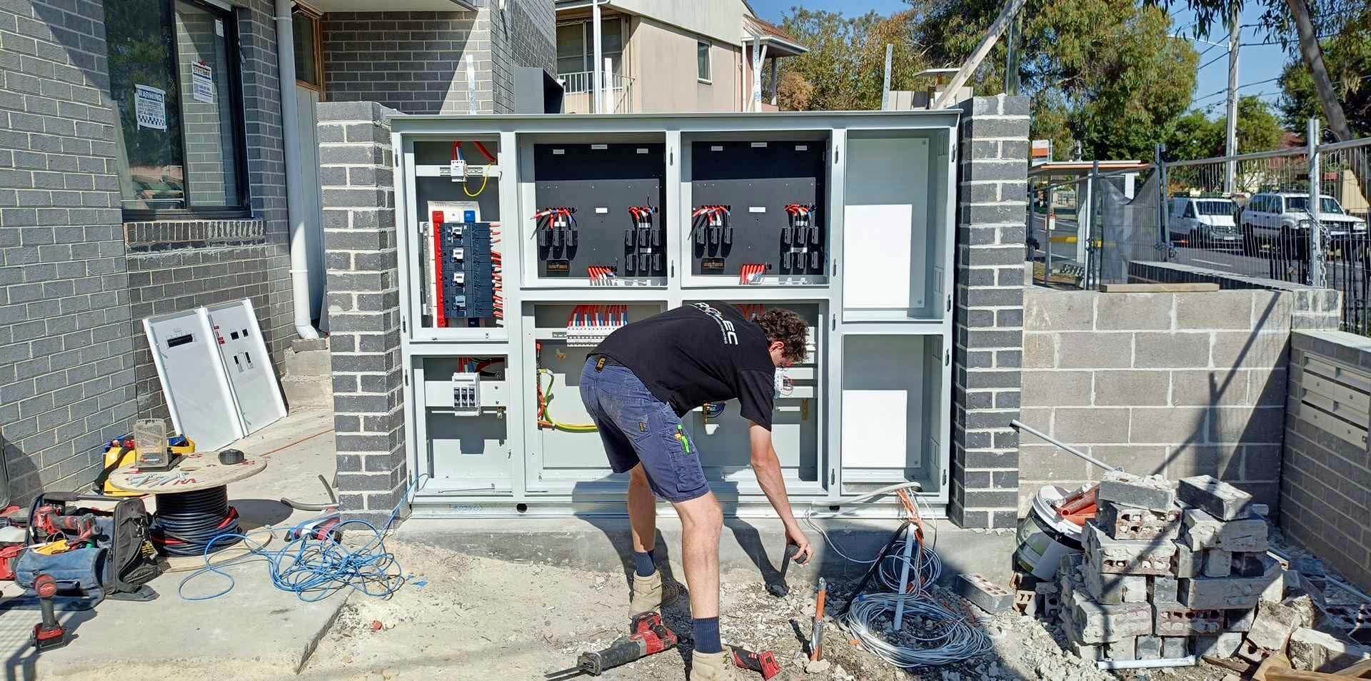 switchboard installation in progress with wiring visible